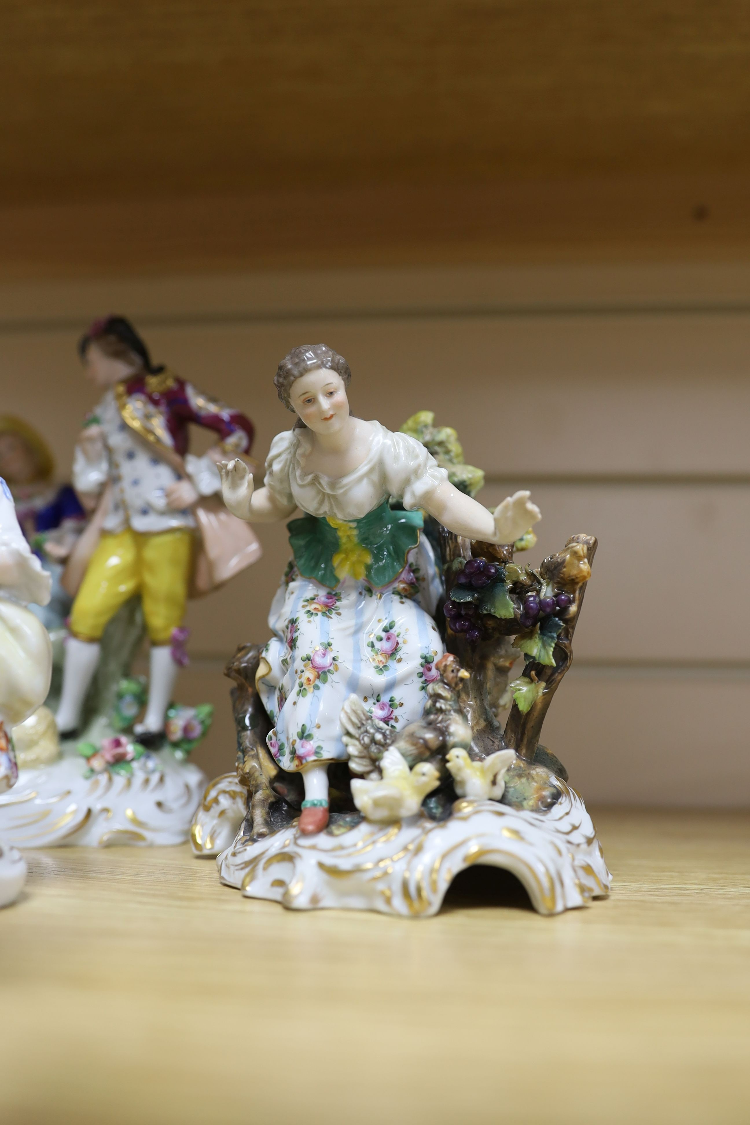 A group of Continental porcelain figurines